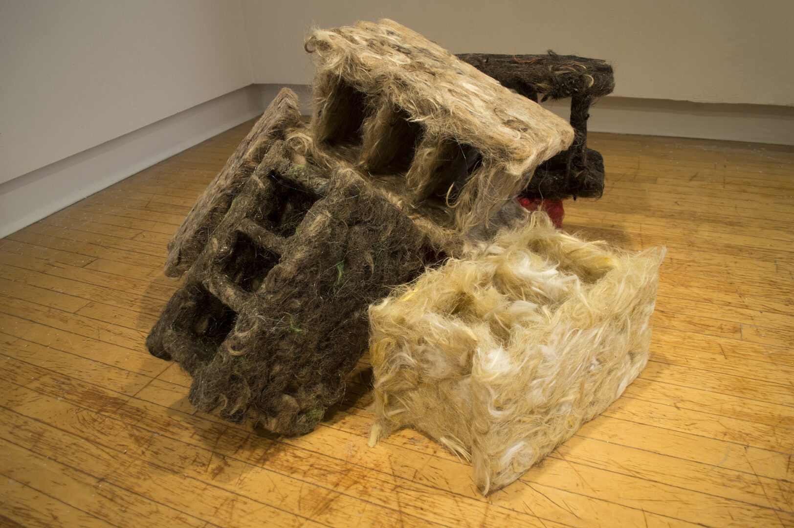 Bradley Weyandt, Hair Block Pile, 2017, Synthetic hair and epoxy resin