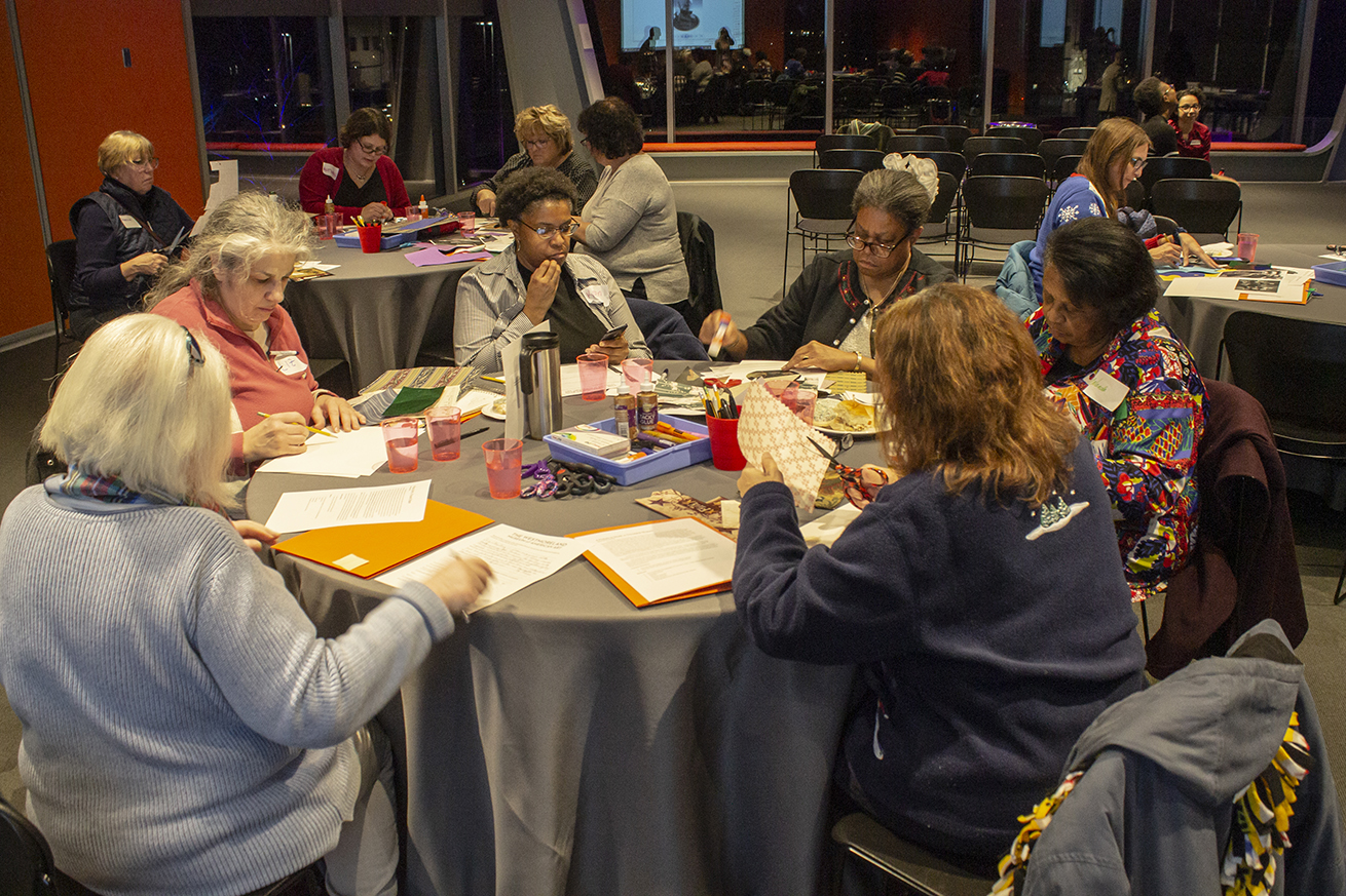 Adults Engaging in Art Making Activity at Museum Event